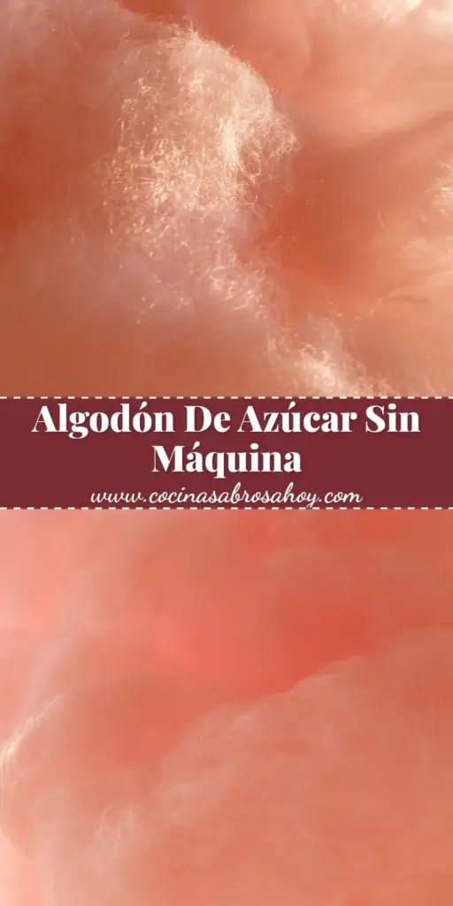 Primer plano de una nube gigante de algodón de azúcar rosa pastel en un palillo de madera de bambú.
